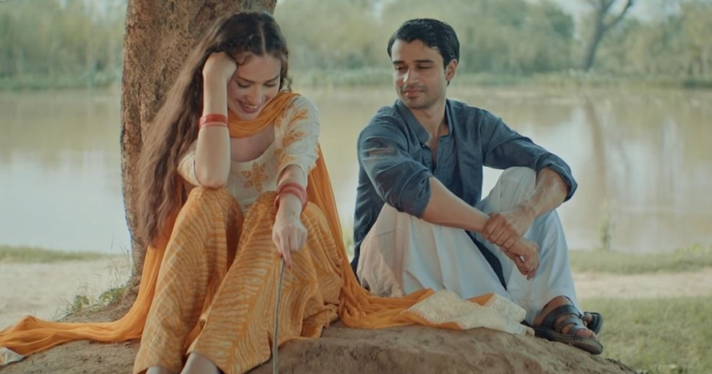 Young Baala and Billo meeting by the riverside in Mitti De Baway